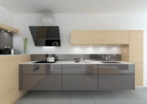 Une cuisine sur-mesure mixant les tons de gris et le bois pour un rendu très contemporain