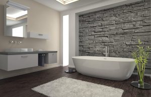 Un mur de parement gris dans cette salle de bain sur-mesure résolument moderne